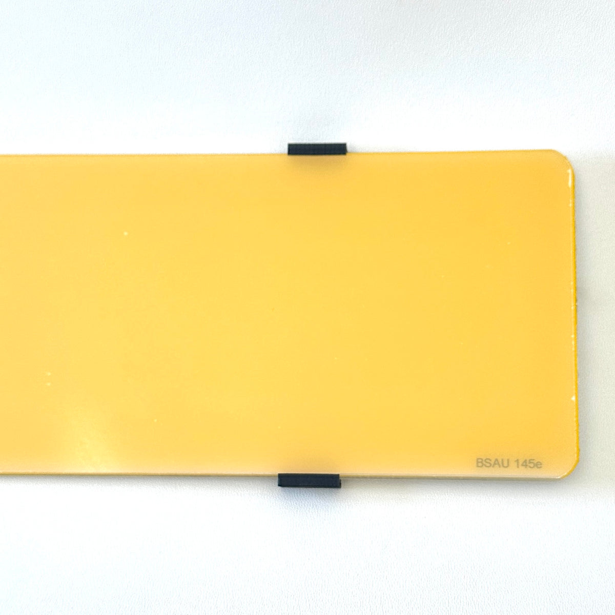 Universal number plate slide fitting for UK number plates