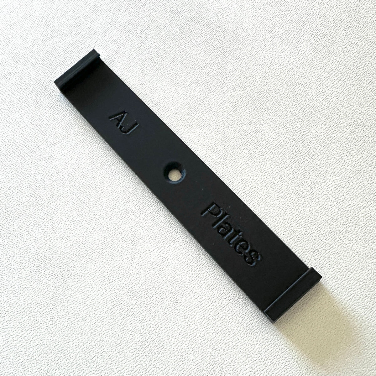Number plate slide fitting bracket, close-up detail